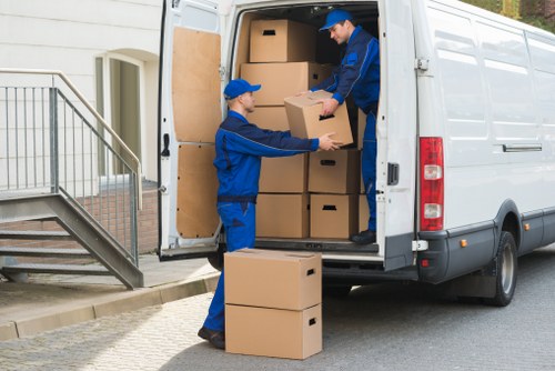 Man and van moving furniture in Stroud Green residential street