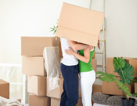 Business relocation setup with labelled boxes and office items ready for transport