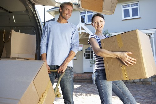 Loading furniture and boxes into a removals van in North London