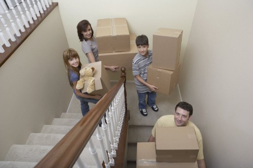 Packed boxes and furniture ready for a local man and van move